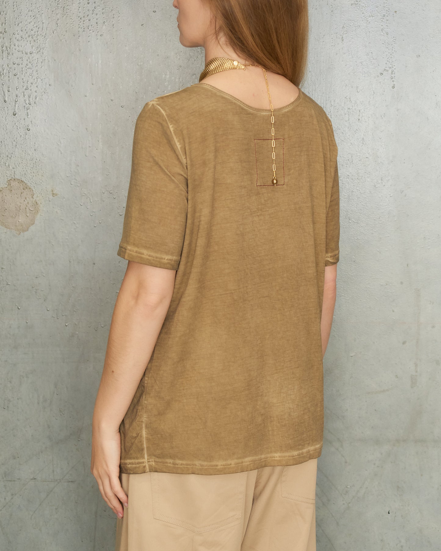 Tan Asymmetric Trap Top