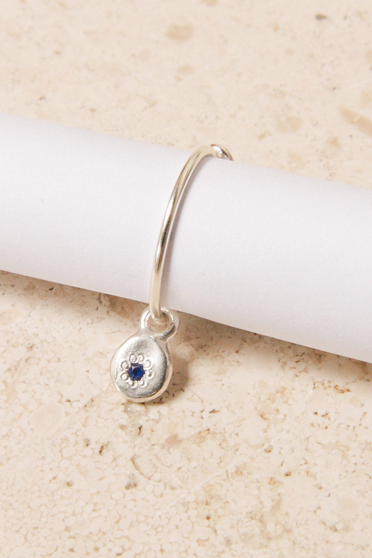 Silver Charm Sleeper with Blue Sapphire